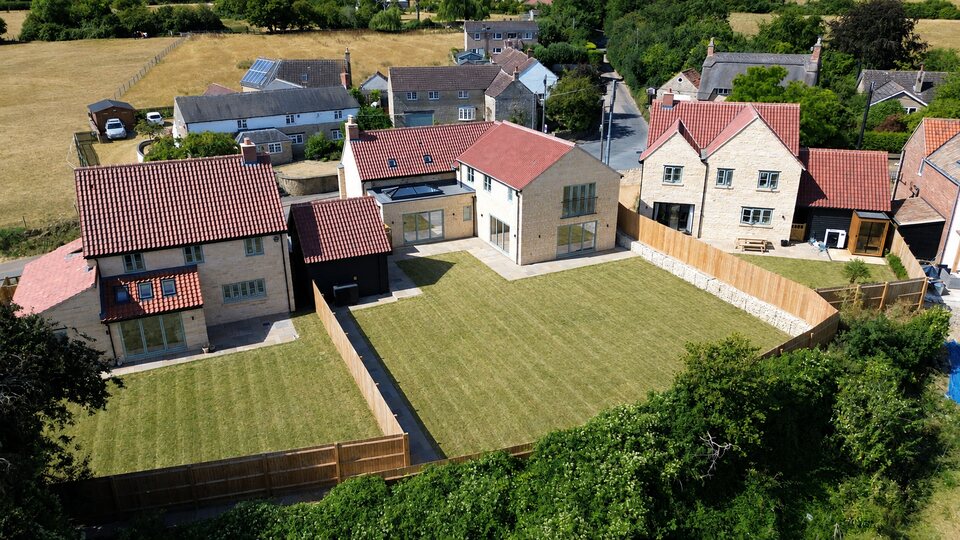 Pepys Lane, Slipton - aerial view showing rear gardens and village setting